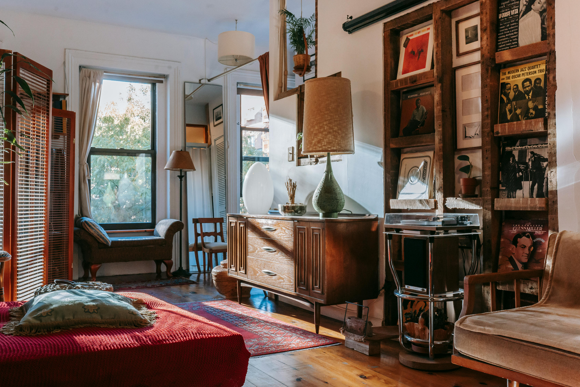 Interior of a room with 19th and 20th century furniture, lighting and decoration